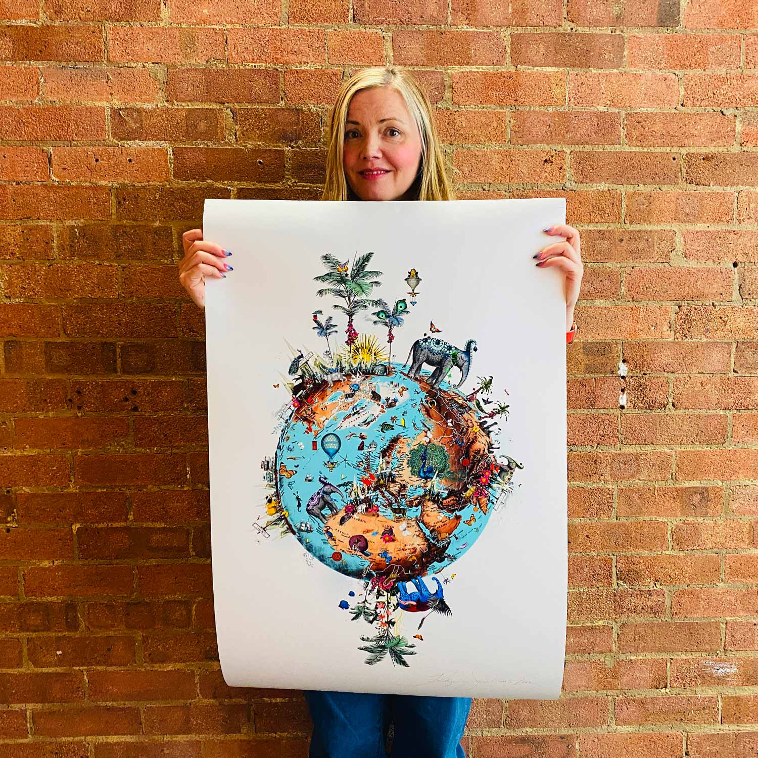 mountain of giraffe ocean jordin II blue and brown globe of the world covered in giraffes leopards hot air balloons butterflies birds sea life trees by artist kristjana williams