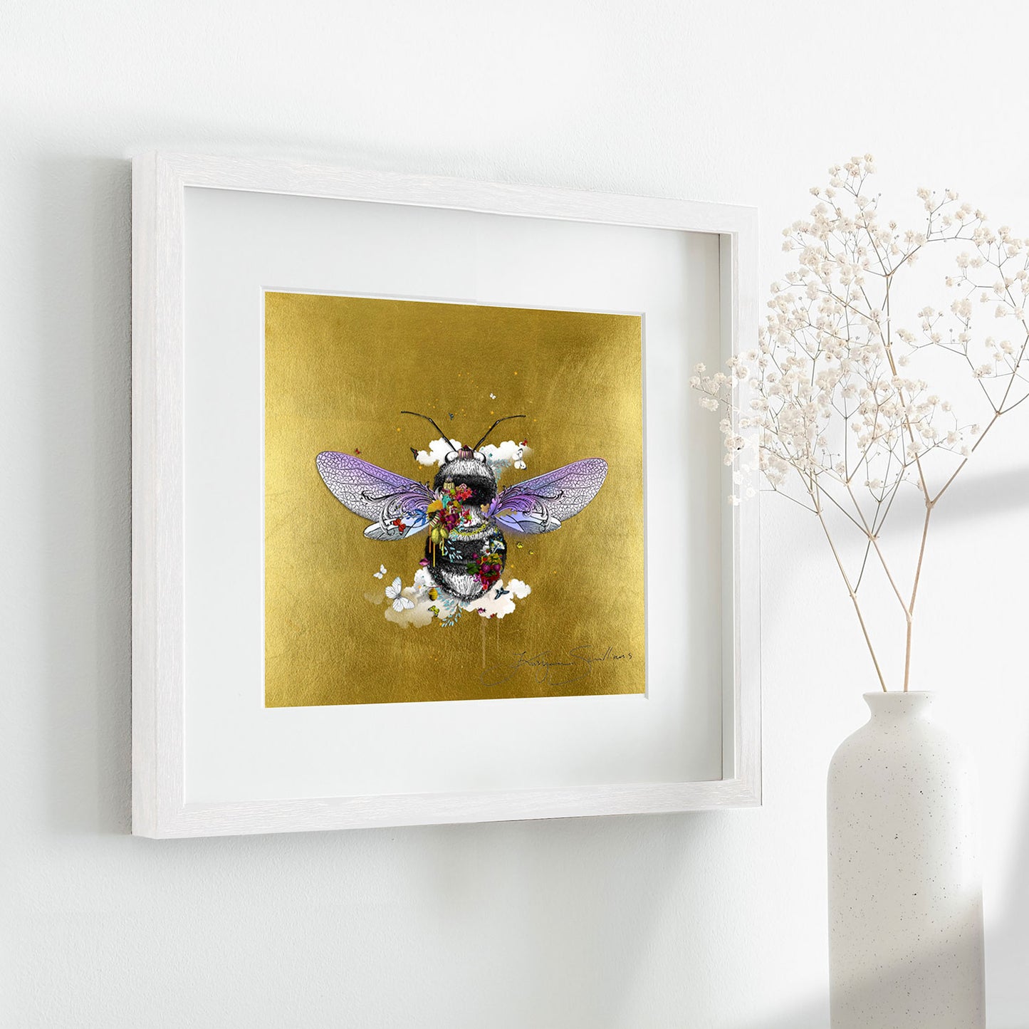 warm golden honey bee limited edition print black and grey honey bee with purple wings covered in bright yellow purple red flowers surrounded by butterflies and birds and clouds set on a gold leaf background by artist Kristjana Williams