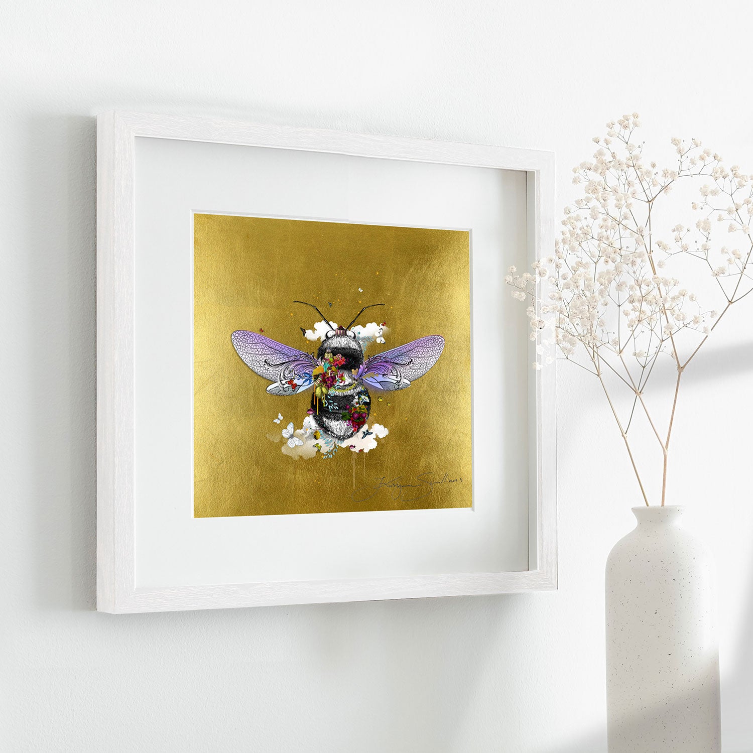 warm golden honey bee limited edition print black and grey honey bee with purple wings covered in bright yellow purple red flowers surrounded by butterflies and birds and clouds set on a gold leaf background by artist Kristjana Williams